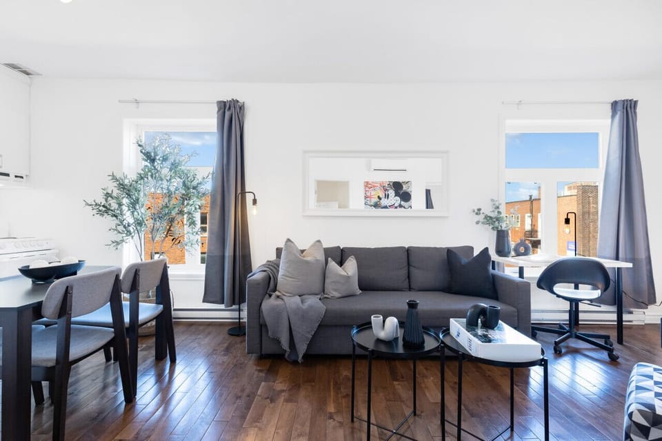 Living Room: Features 1 sofa bed, 1 queen-size bed with memory foam, Smart HD TV with Netflix, YouTube, and Prime.