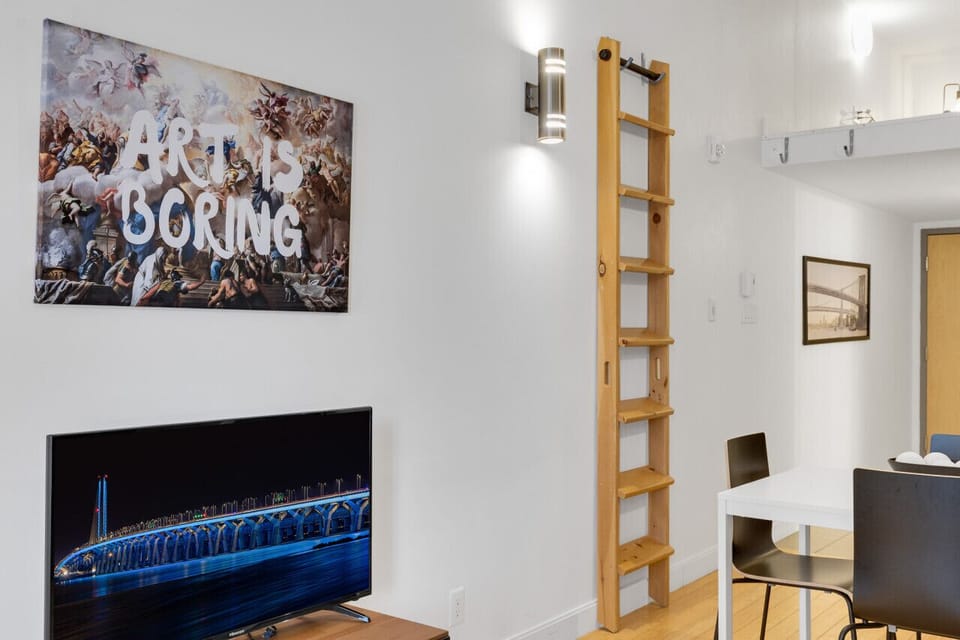 Mezzanine: Features a queen mattress with a luxurious memory foam. (Note: Ladder access, low ceiling.)
