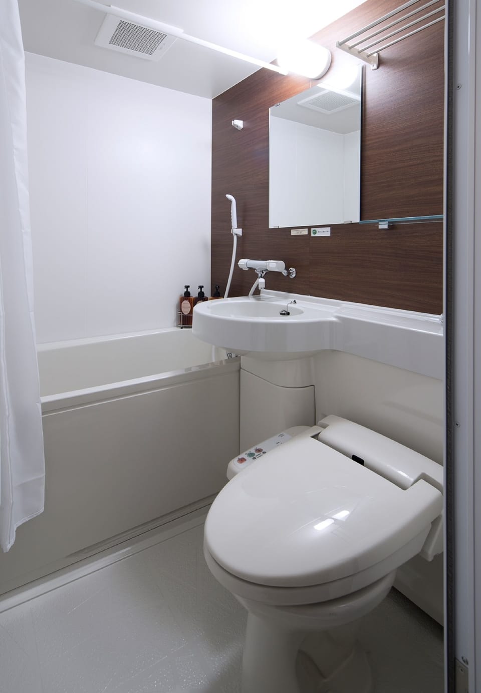 Free toiletries, hair dryer, slippers, electronic bidet