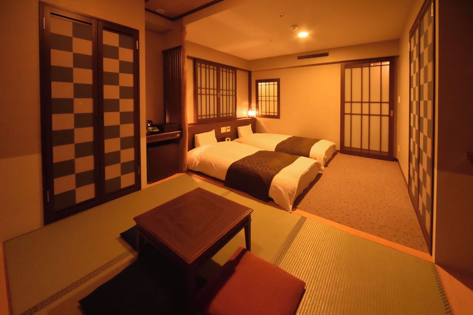 Down comforters, desk, blackout drapes, soundproofing