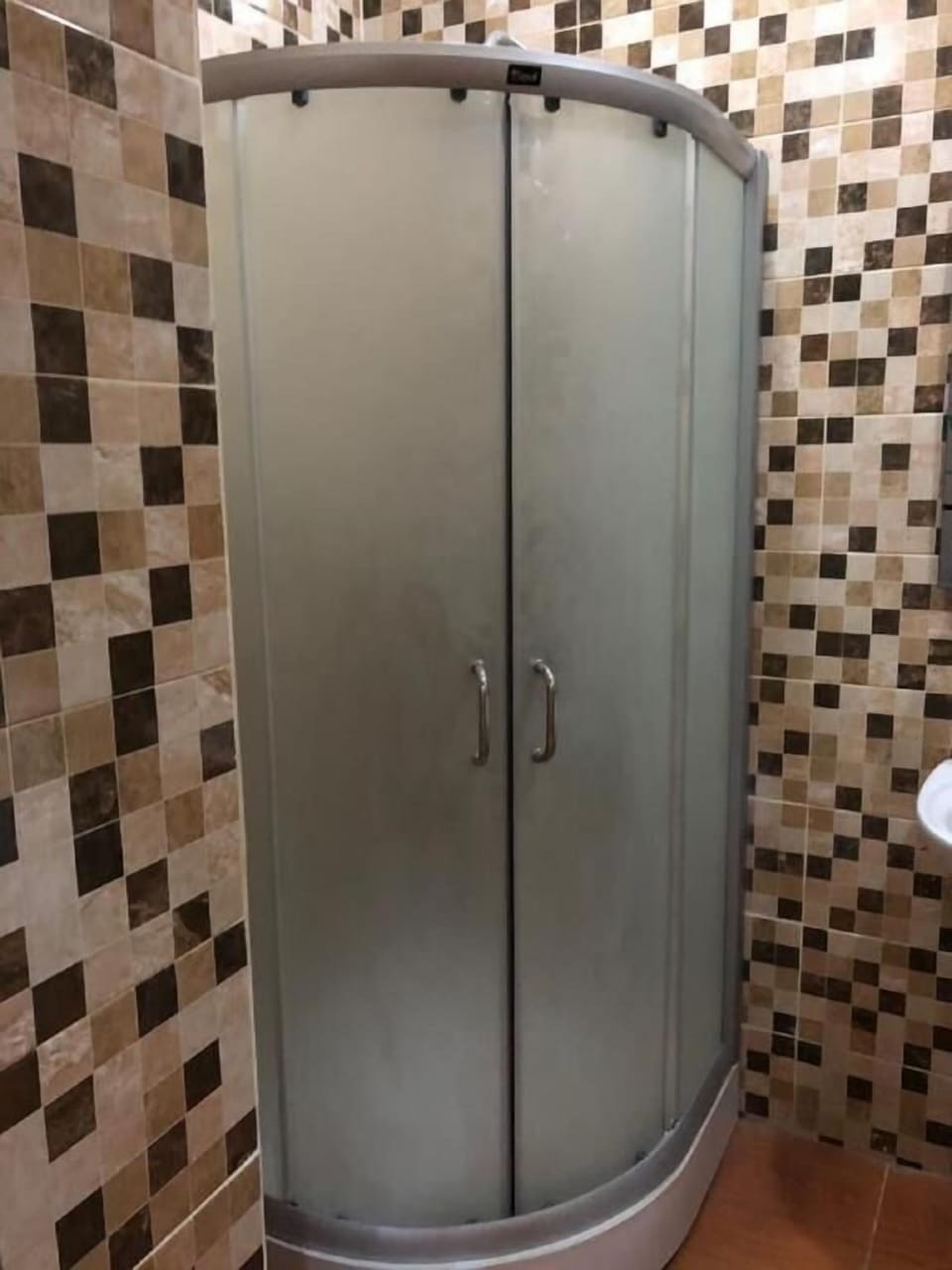 Shower, rainfall showerhead, towels