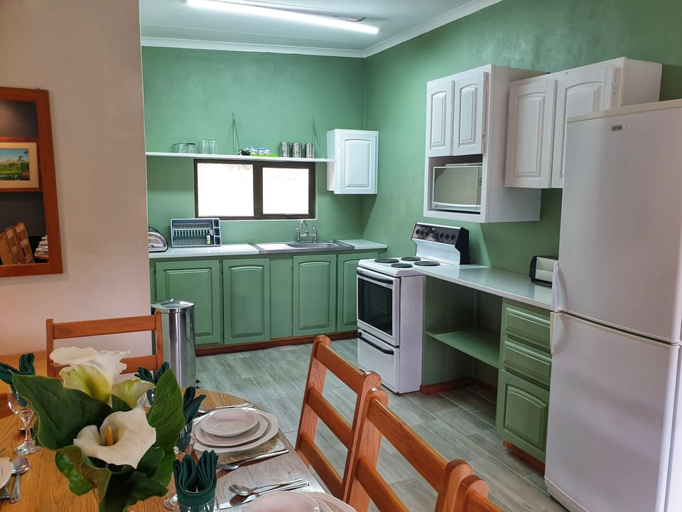Family Cottage | Private kitchen | Fridge, microwave, oven, stovetop