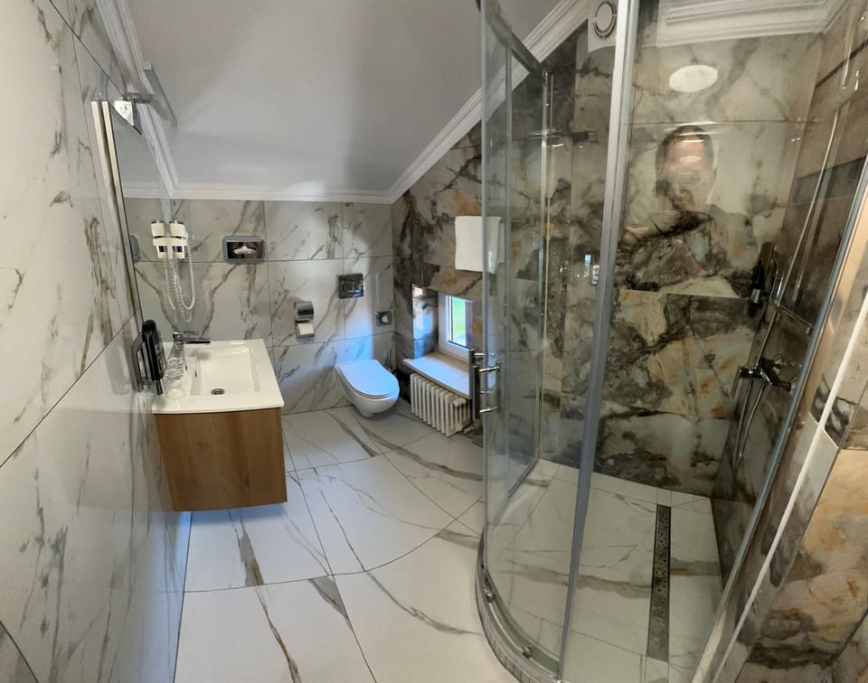 Triple Room | Bathroom | Shower, hair dryer, towels