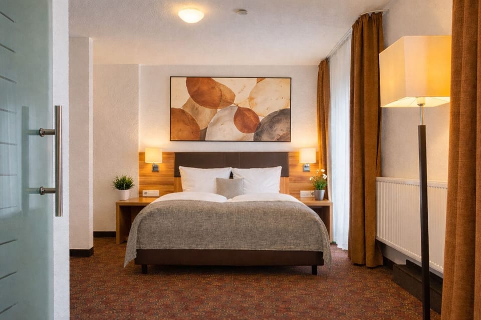 Hypo-allergenic bedding, desk, blackout drapes, soundproofing
