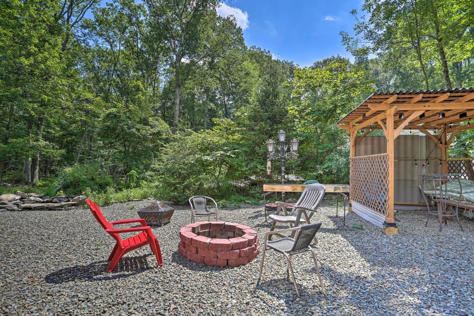 Property Exterior | Charcoal Grill | Koi Pond | Fire Pit