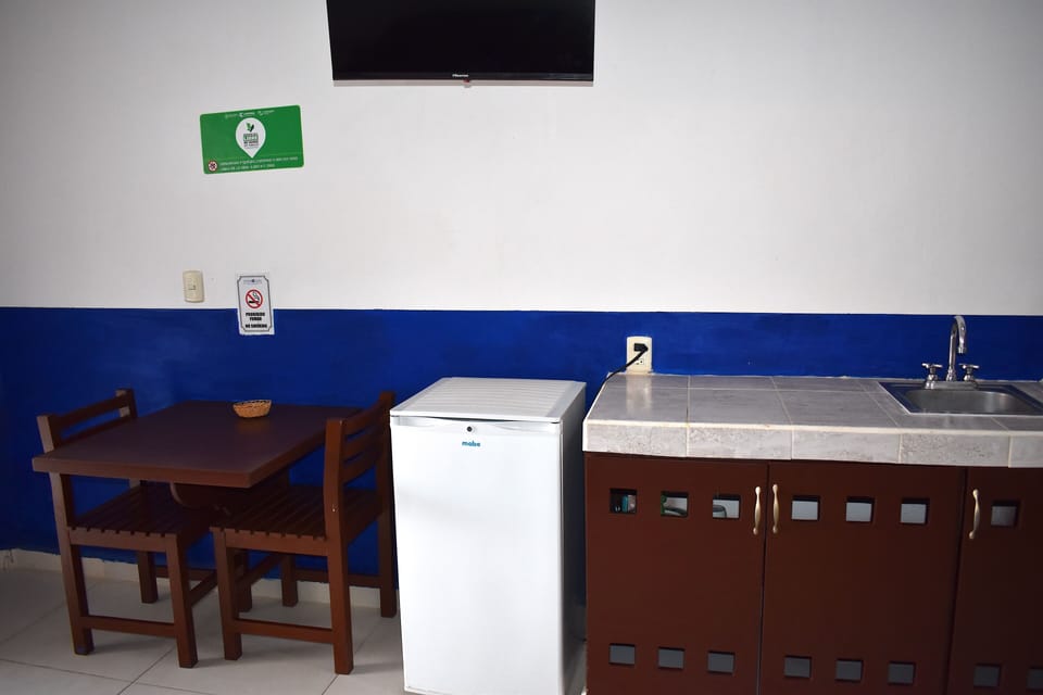 Standard Room | Living area | 20-cm TV with cable channels