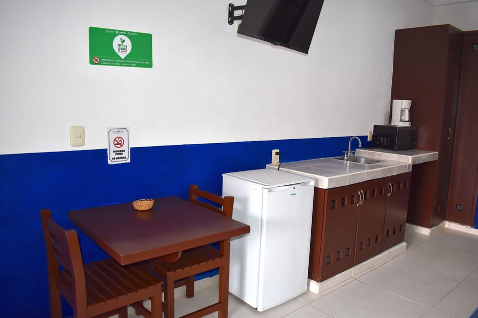 Standard Room | Living area | 20-cm TV with cable channels