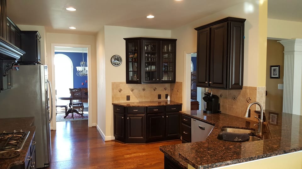 The kitchen is convenietly located in the middle floor with access to dinning rm