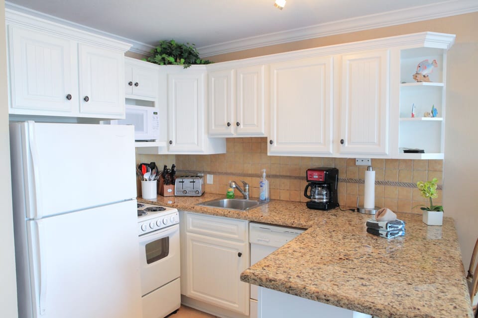 Everything you want - pots, pans, blender, coffee maker. Pantry is stocked too!