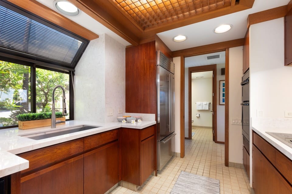 The updated kitchen is bright and modern 