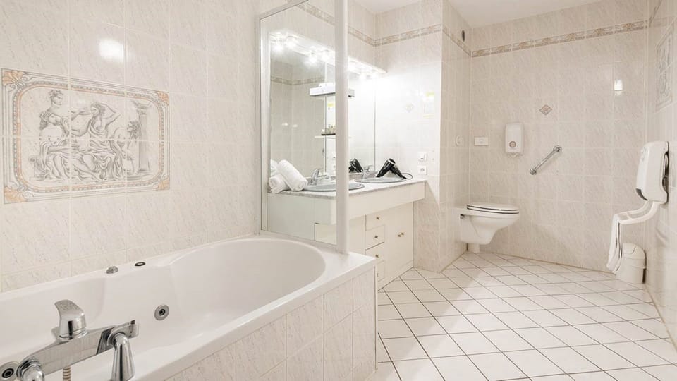 Family Room, Jetted Tub | Bathroom | Free toiletries, hair dryer, towels