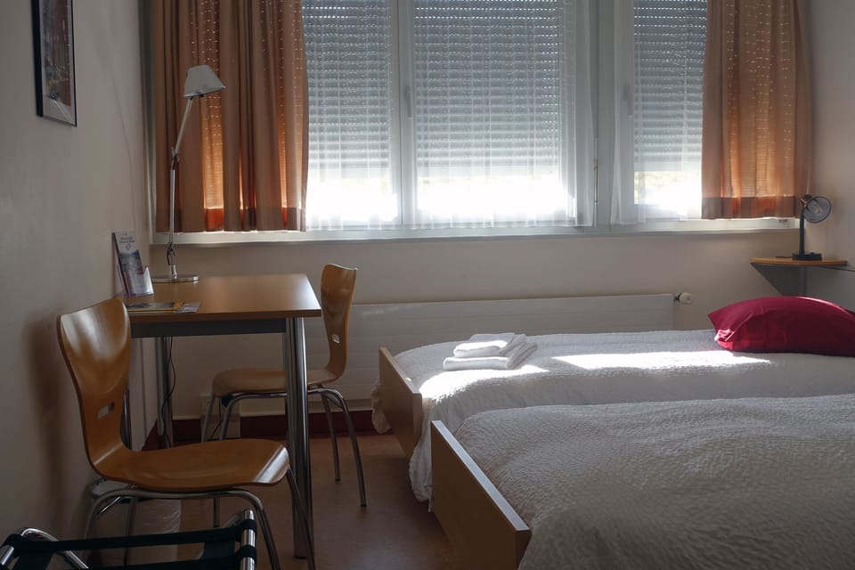 Standard Room, 2 Twin Beds | Individually furnished, desk, free WiFi, wheelchair access