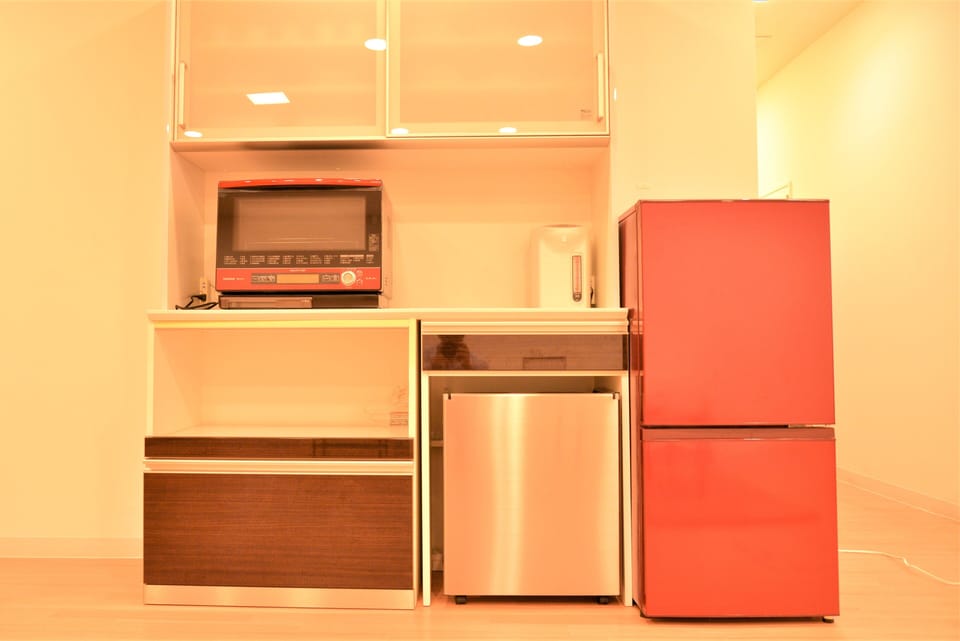 Mini-fridge, microwave, cookware/dishes/utensils