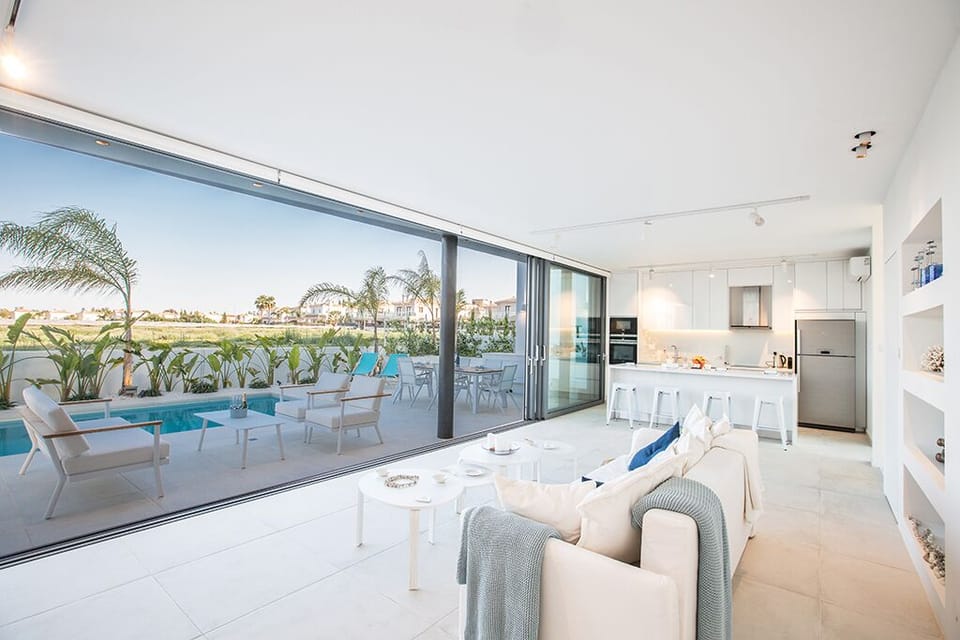 Ground Floor with large patio doors leading to the garden and pool area