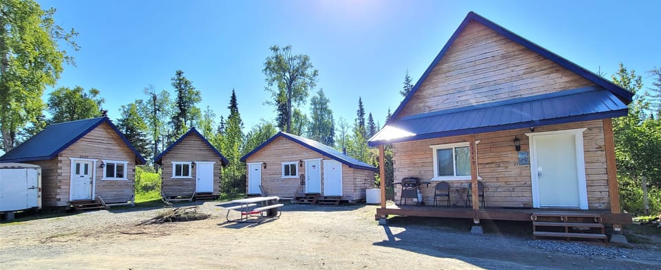 From left to right, Bear Cabin, Wolf Cabin, Wash-house, Moose Cabin