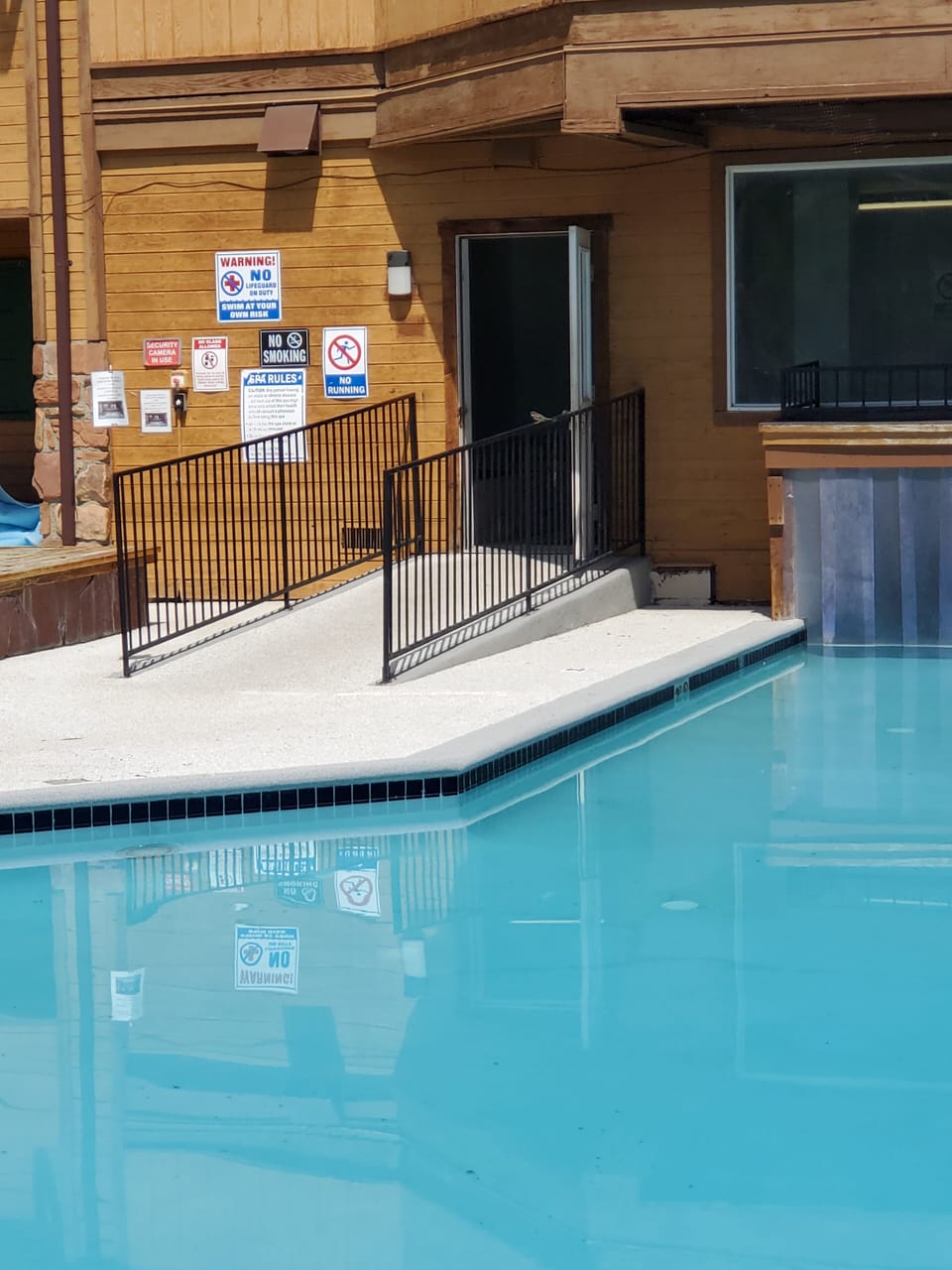 pool in front, and 1 outdoor hot tub  to the left