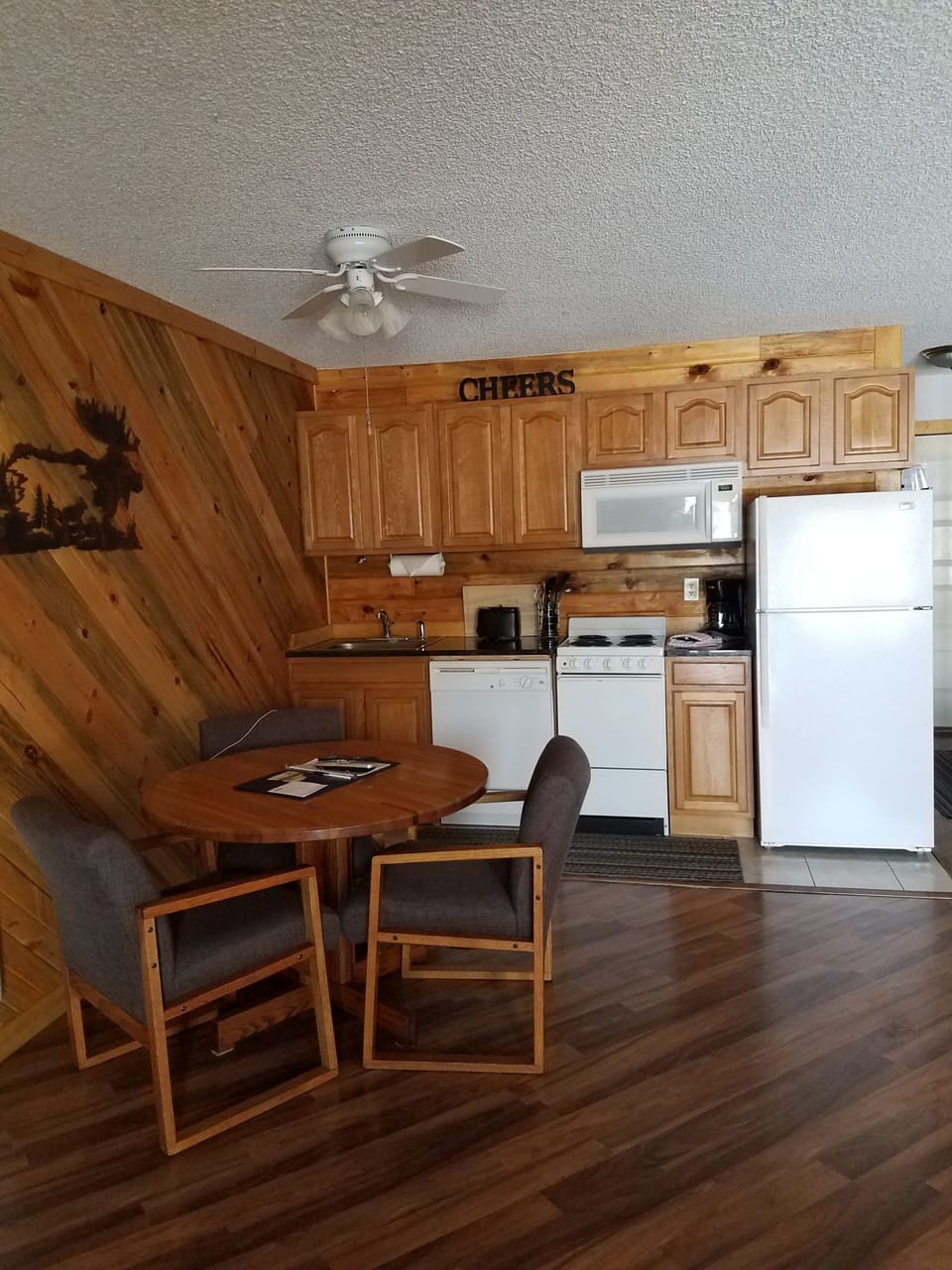 full kitchen, loaded with utensils and cookware