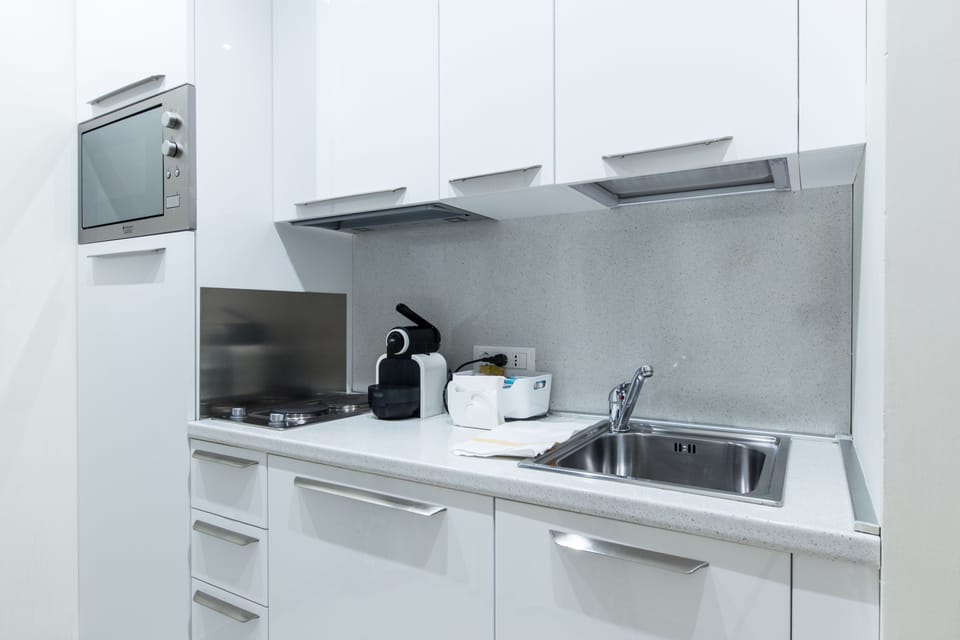 Full-size fridge, microwave, stovetop, espresso maker