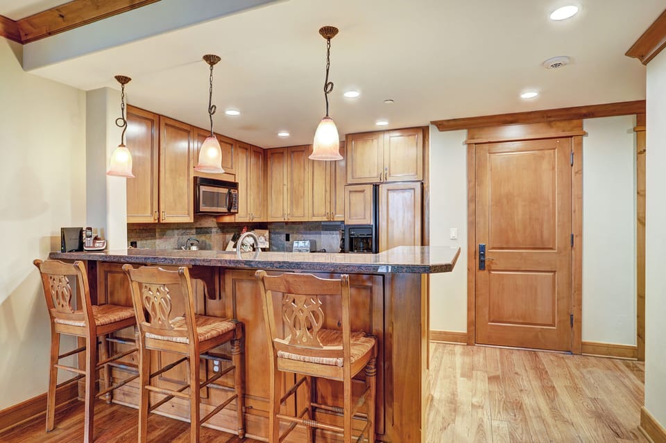 Condo, 2 Bedrooms | Private kitchen | Fridge, microwave, oven, coffee/tea maker