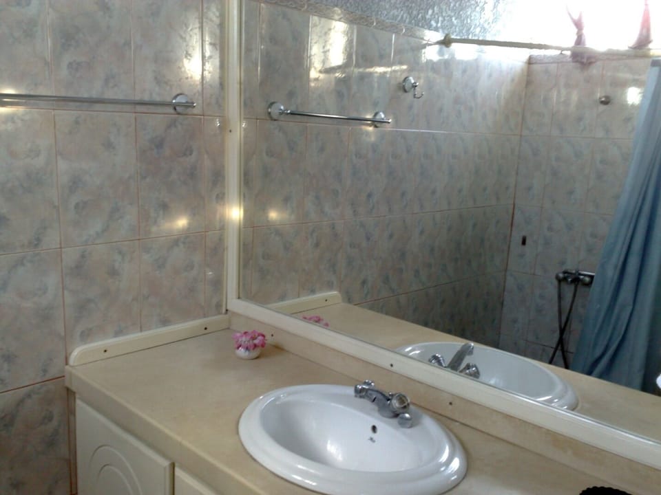Shower, towels, soap, toilet paper