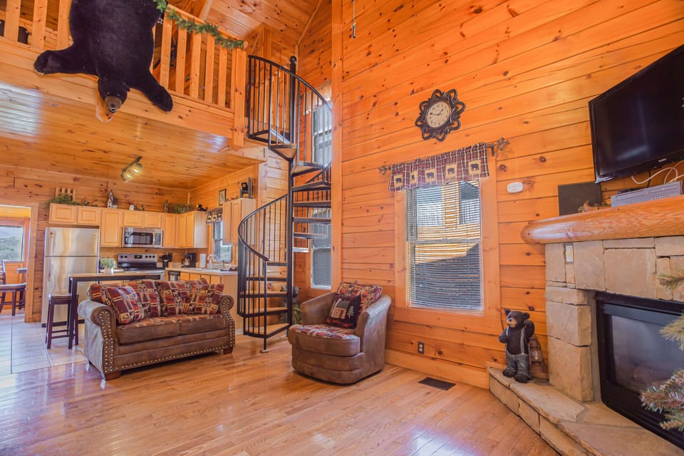 The open layout of the main floor makes the cabin feel more spacious for your group and pet to gather around.