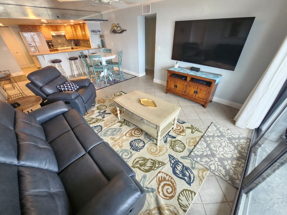Beachside living room with 75-inch smart TV!