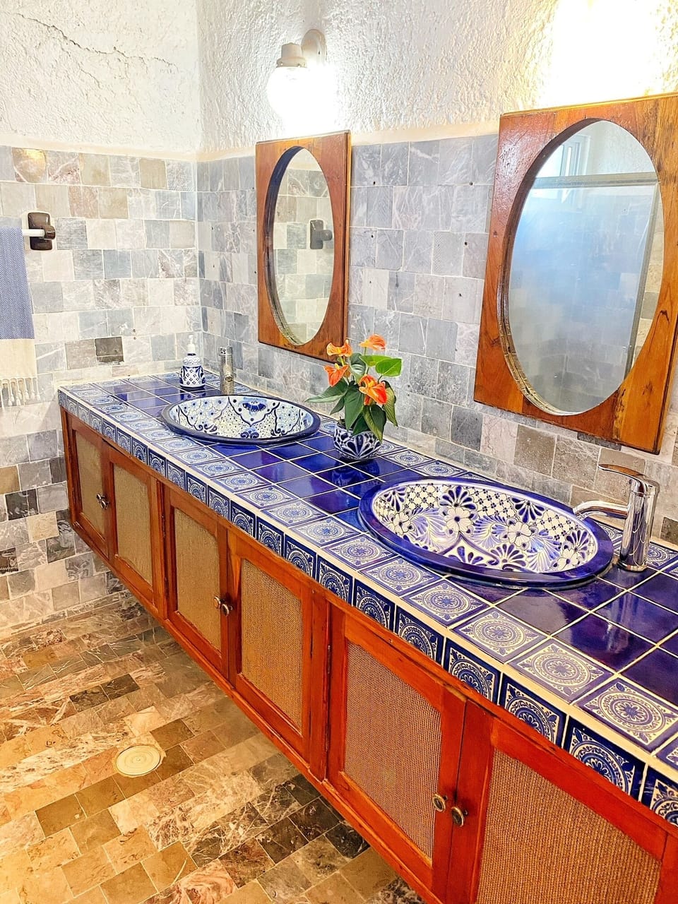 Upstairs second bathroom with beautiful hand painted Mexican tiles and sinks.