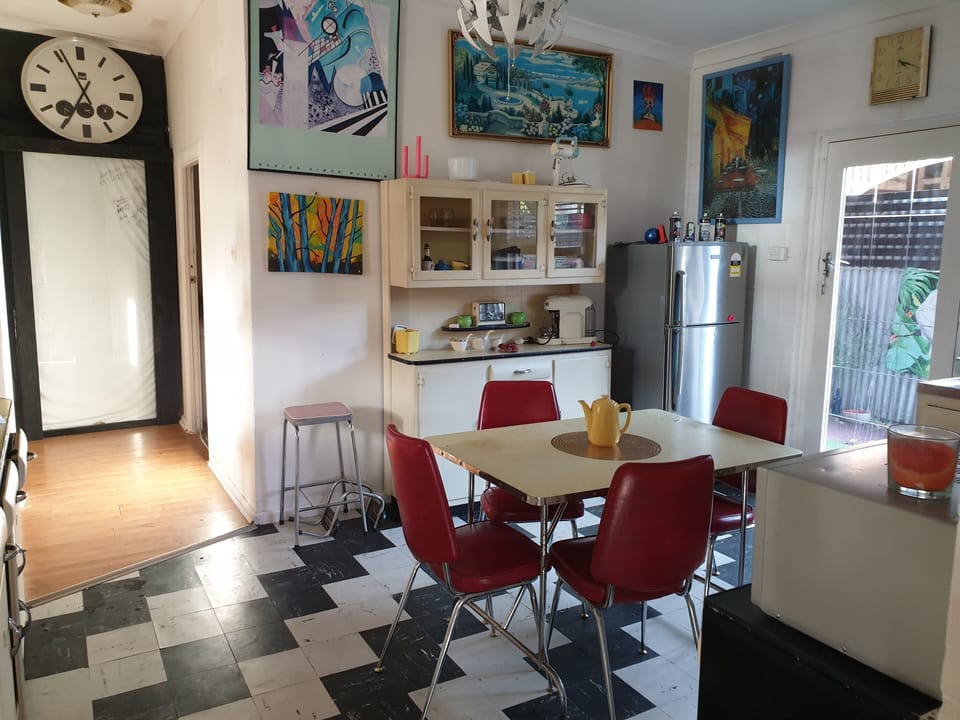 kitckitchen with huge gas stove, fridge with ice maker, dish washer and more.