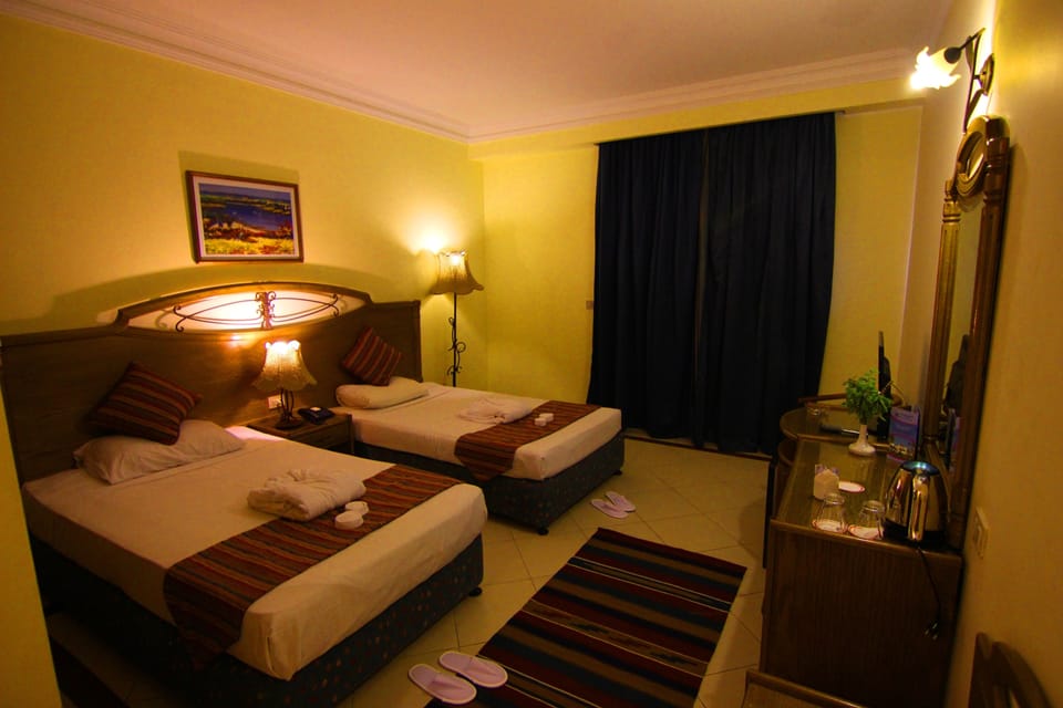 Standard Double or Twin Room, Pool View | Bathroom | Separate tub and shower, rainfall showerhead, hair dryer, towels