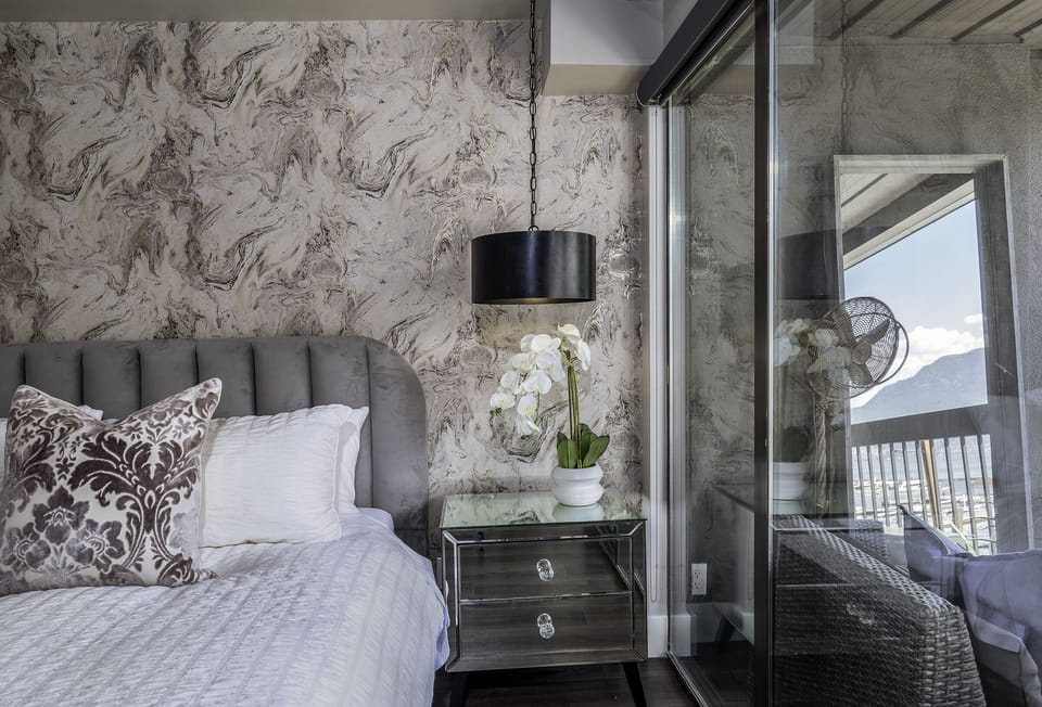 Floor to ceiling windows to capture view of the lake and mountains!