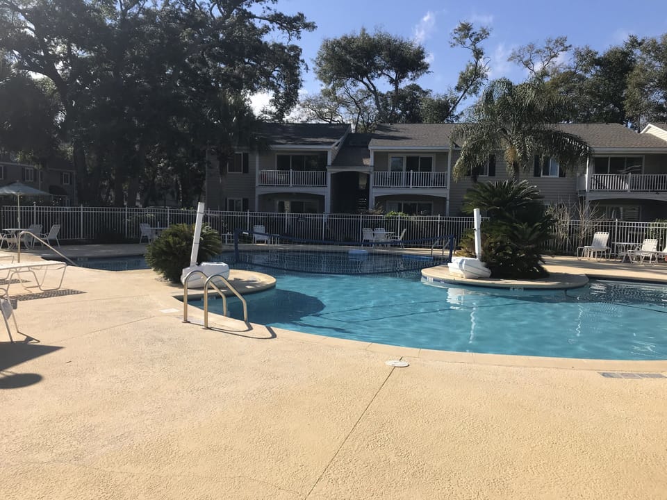 Large heated year-round pool a short walk from our unit. 