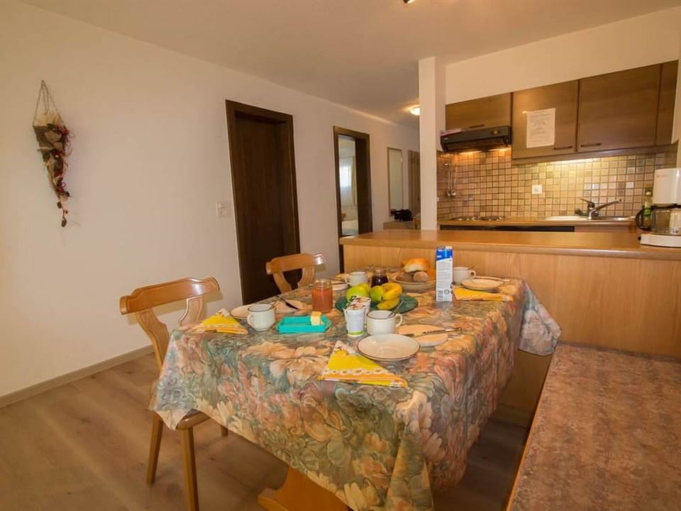 Table, Furniture, Cabinetry, Tap, Chair, Wood, Interior Design, Countertop, Kitchen & Dining Room Table, Floor