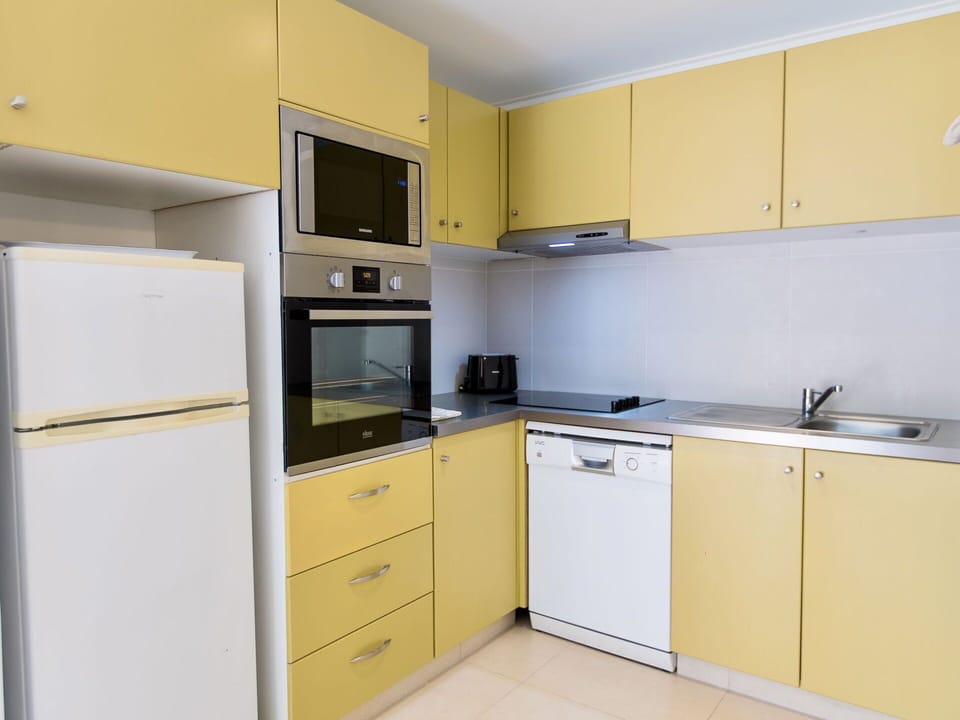 Cabinetry, Countertop, Kitchen Appliance, Kitchen Stove, Kitchen, Drawer, Building, Home Appliance, Interior Design, Wood