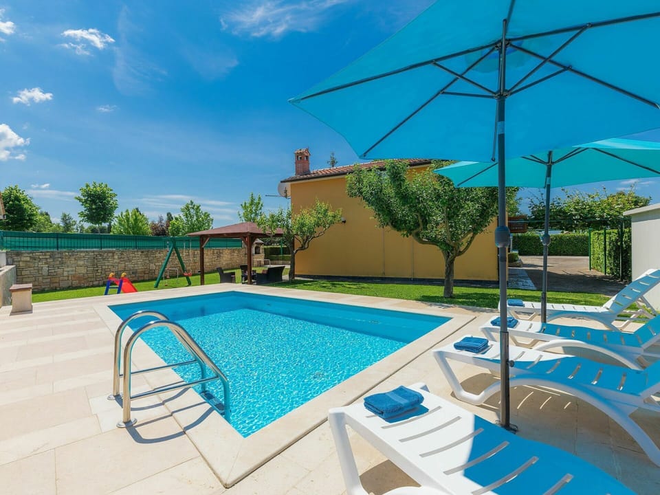 Water, Sky, Property, Plant, Building, Cloud, Swimming Pool, Azure, Shade, Outdoor Furniture