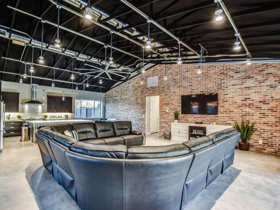 Check Out the Living Room! Roll up Garage Door to bring the Outdoors Inside!