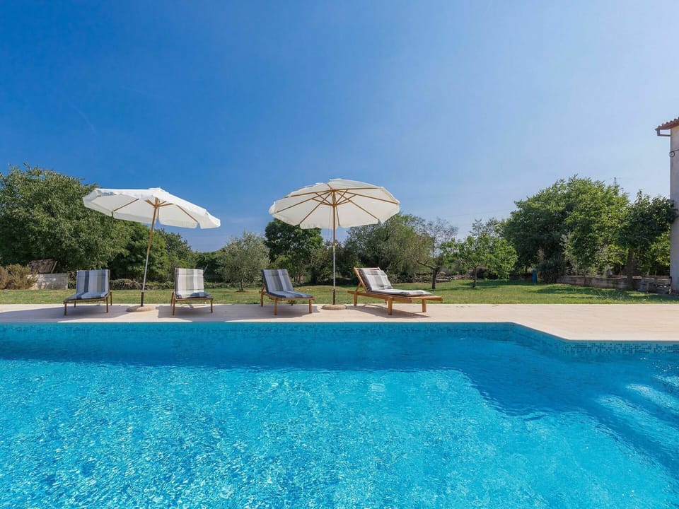 Water, Sky, Plant, Property, Blue, Swimming Pool, Azure, Tree, Shade, Outdoor Furniture