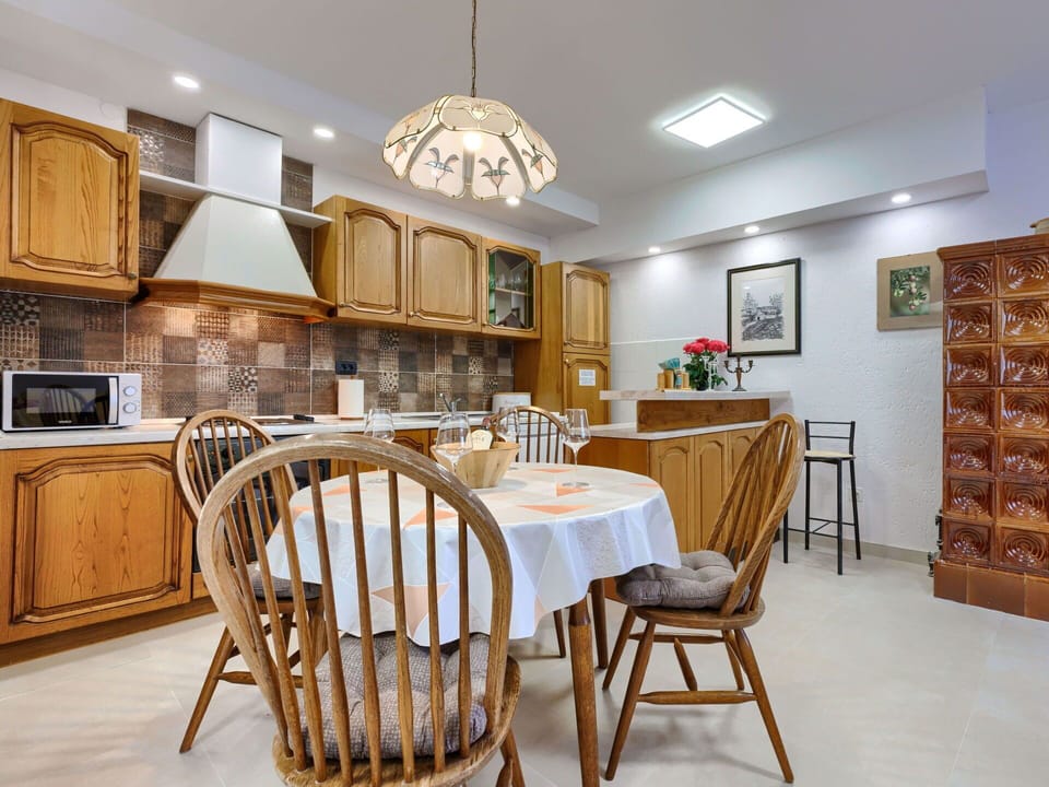 Furniture, Table, Property, Chair, Cabinetry, Lighting, Interior Design, Wood, Countertop, Flooring
