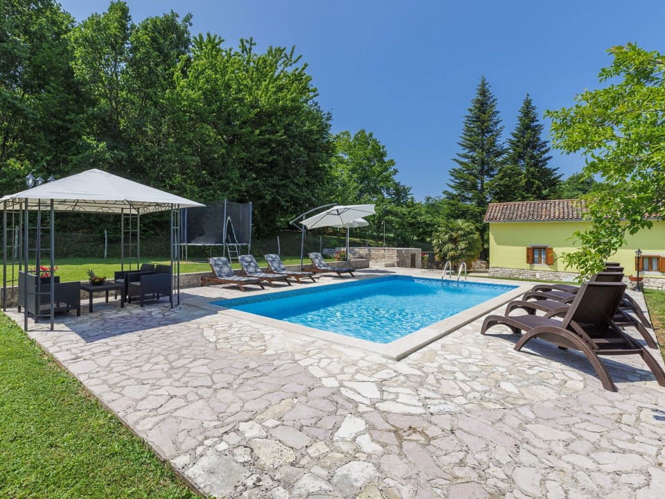 Property, Furniture, Building, Plant, Swimming Pool, Sky, Chair, Outdoor Furniture, Shade, Water