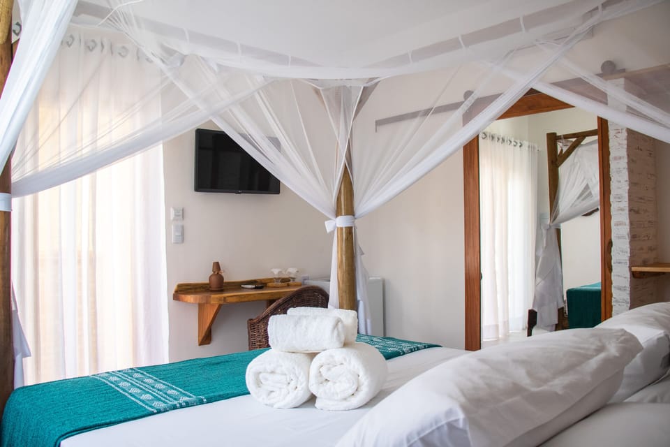 Standard Double Room | Minibar, in-room safe, desk, blackout drapes