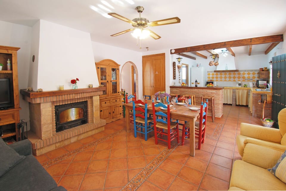 Living room and kitchen in typical spanish style. 