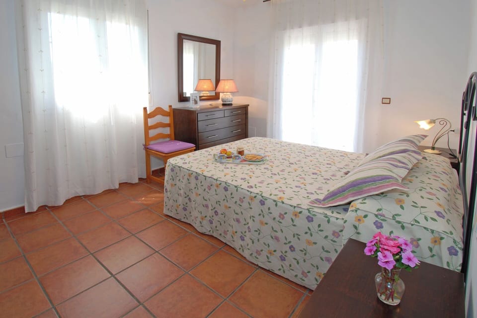 Bedroom 1 is spacious and has entry on the balcony.