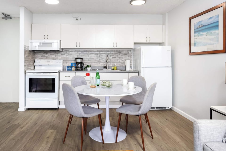Prepare delicious meals in your fully-equipped kitchen and dine together at your dining table with 4 chairs.