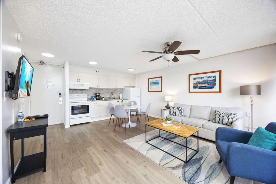 Experience the ultimate in open-concept living in your bright condo that seamlessly blends a modern kitchen, dining area, and cozy lounge.