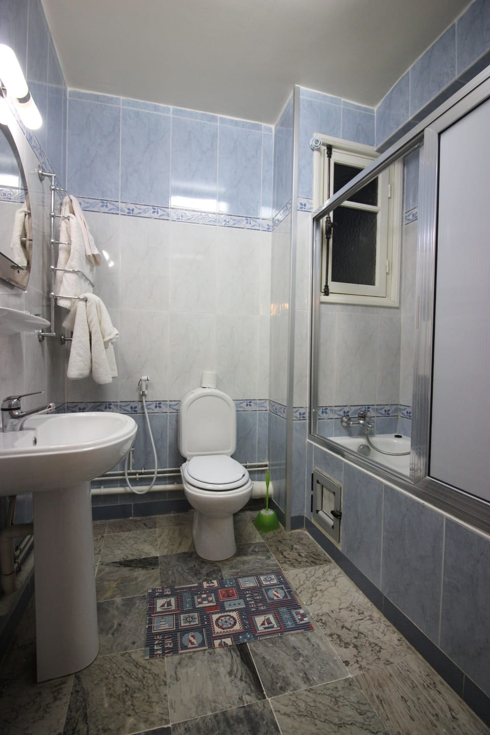 Shower, designer toiletries, hair dryer (on request), towels