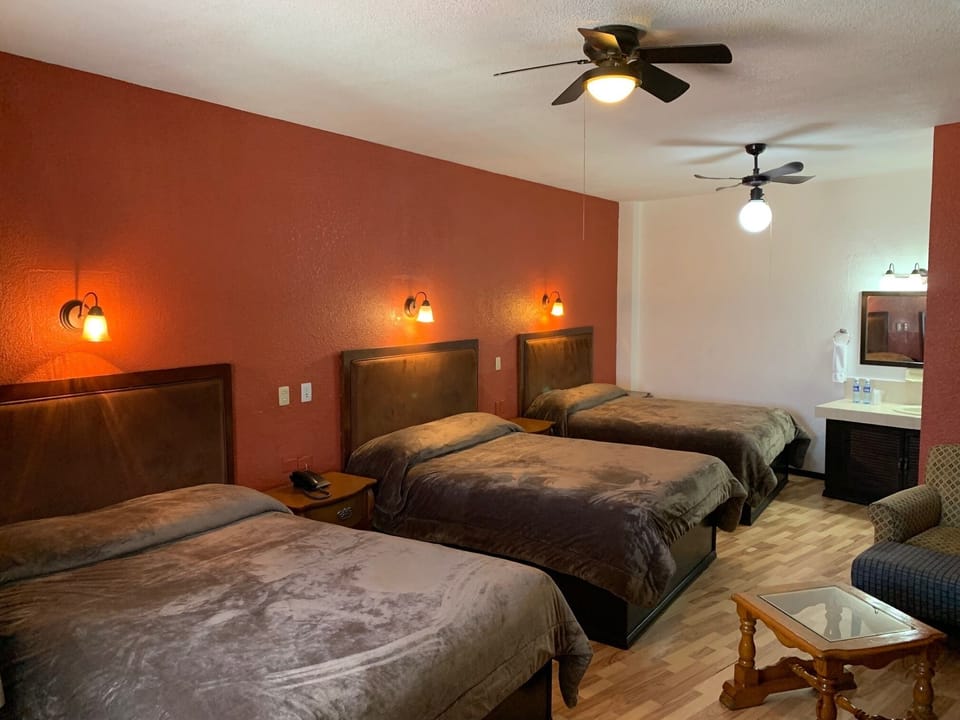 Triple Room | Iron/ironing board, free rollaway beds, free WiFi, bed sheets