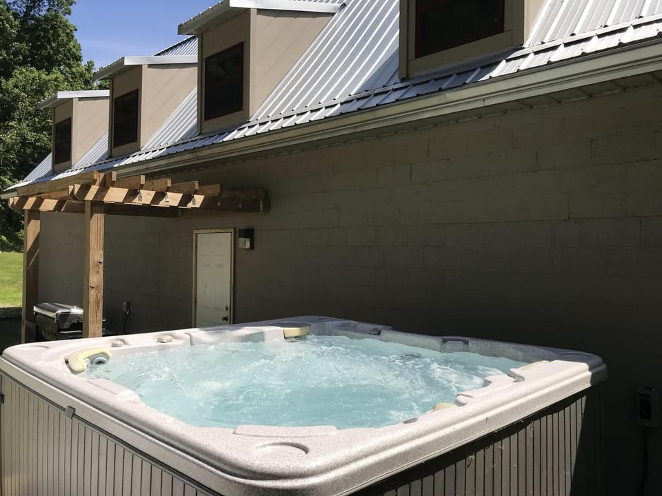 Sip a cocktail in the toasty tub on chilly evenings