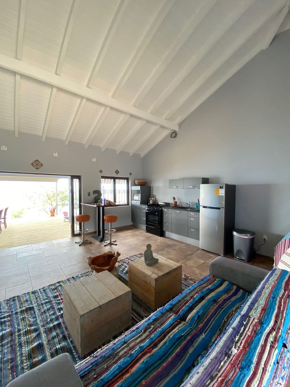 Large living space is breezy and comfortable.