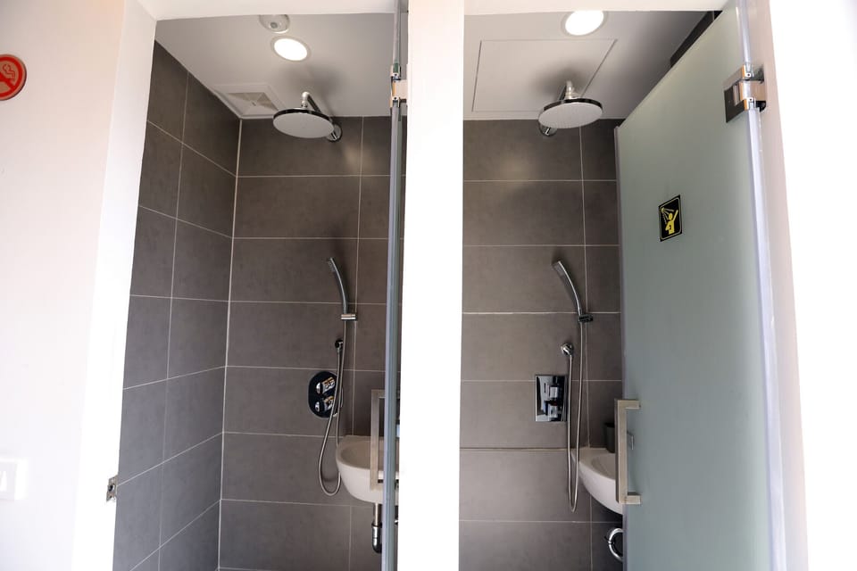 Shower, free toiletries, hair dryer, slippers