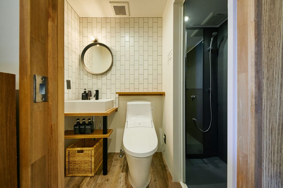 Shower, free toiletries, hair dryer, slippers