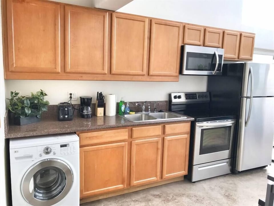 Kitchen area, bathroom at the end